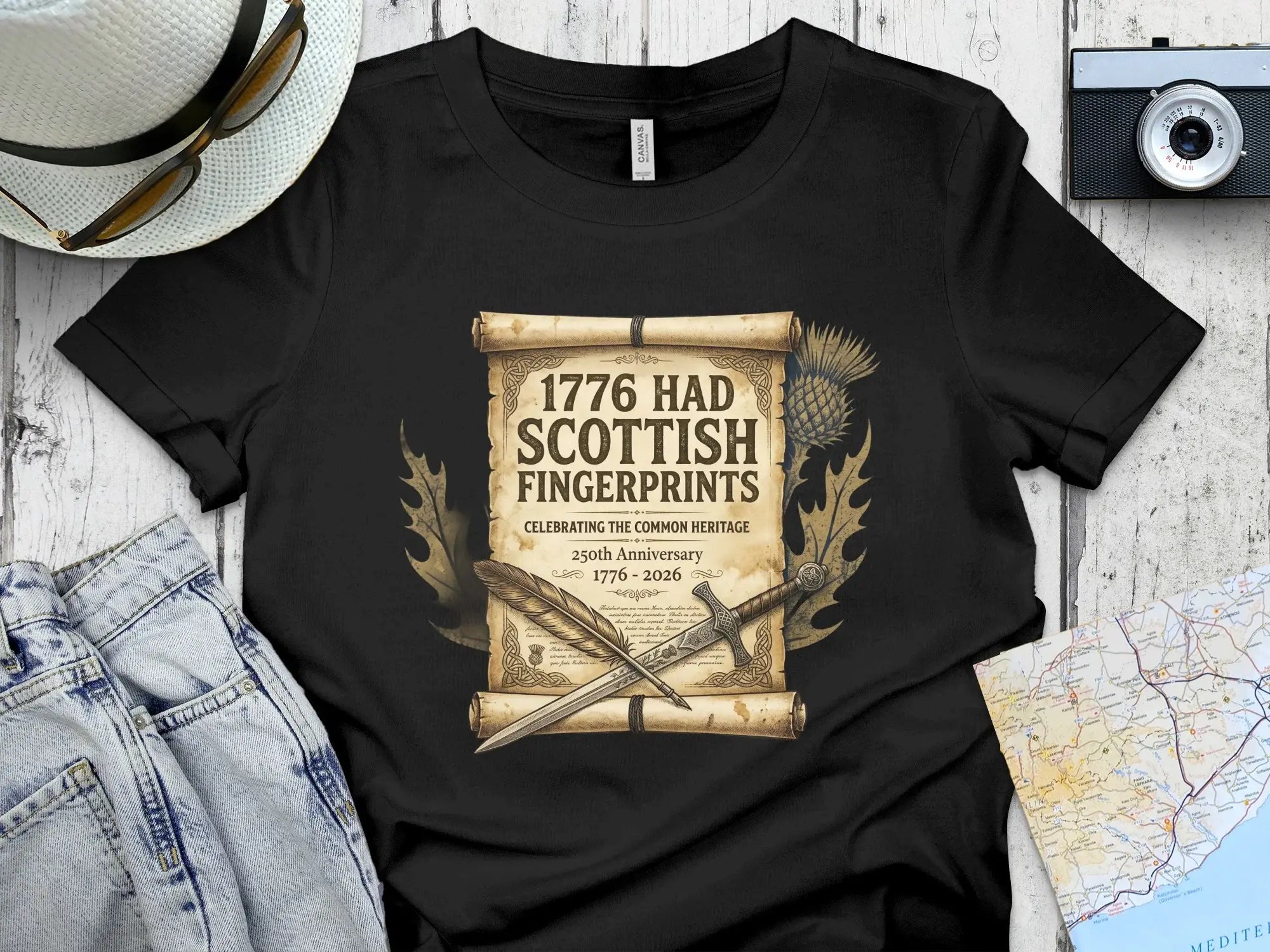 Black t-shirt with "1776 Had Scottish Fingerprints" design.