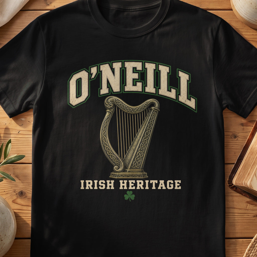 O'Neill Irish harp T-shirt in Black, with cream surname lettering, a gold-toned harp, green shamrock and “Irish Heritage” text.