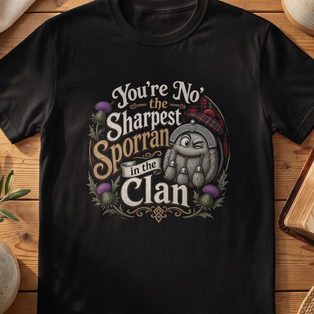 Black Gildan 64000 unisex T-shirt flatlay with Sharpest Sporran in the Clan Scottish graphic design
