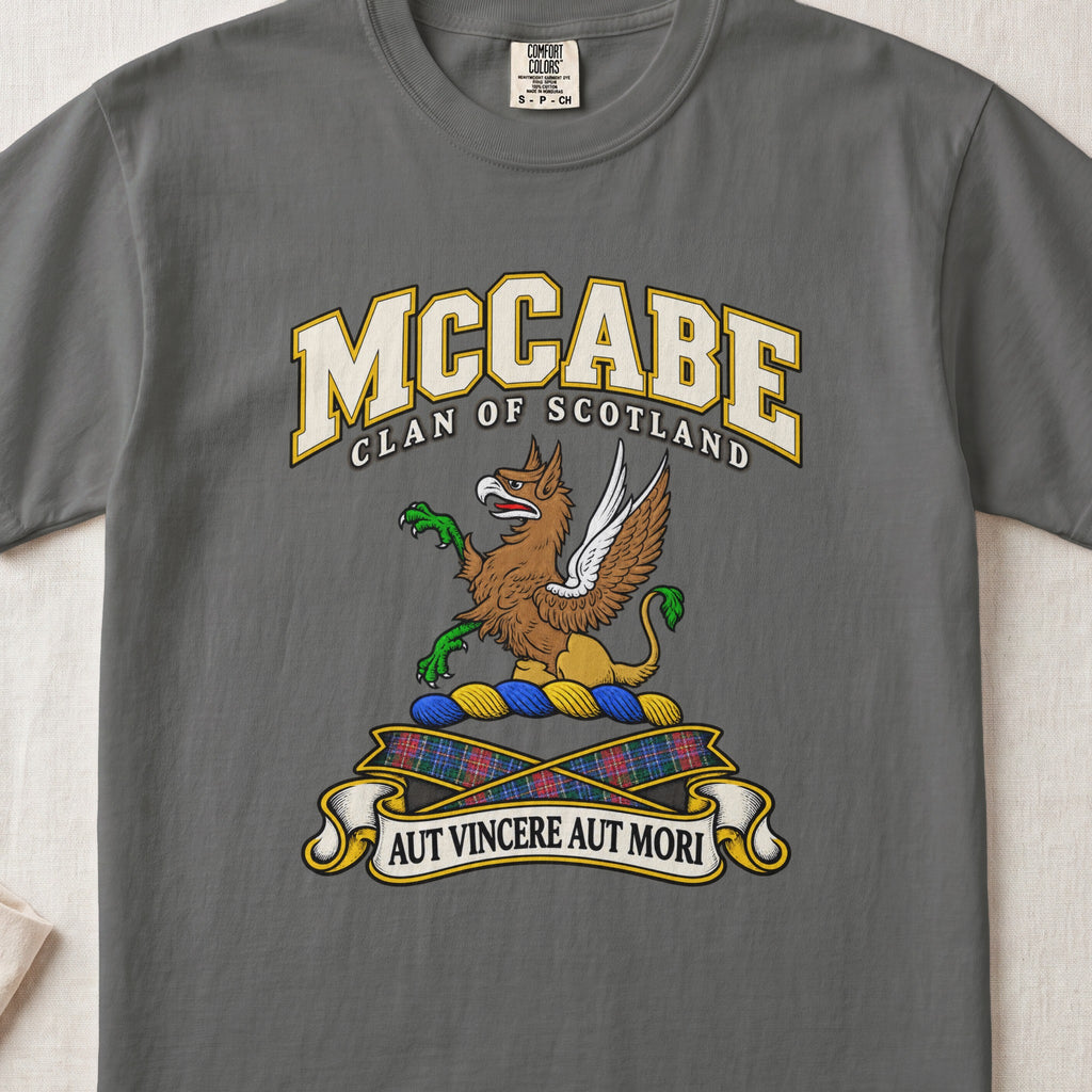 McCabe Scottish clan T-shirt in Pepper, front view with a brown and gold winged griffin with green claws and motto banner.