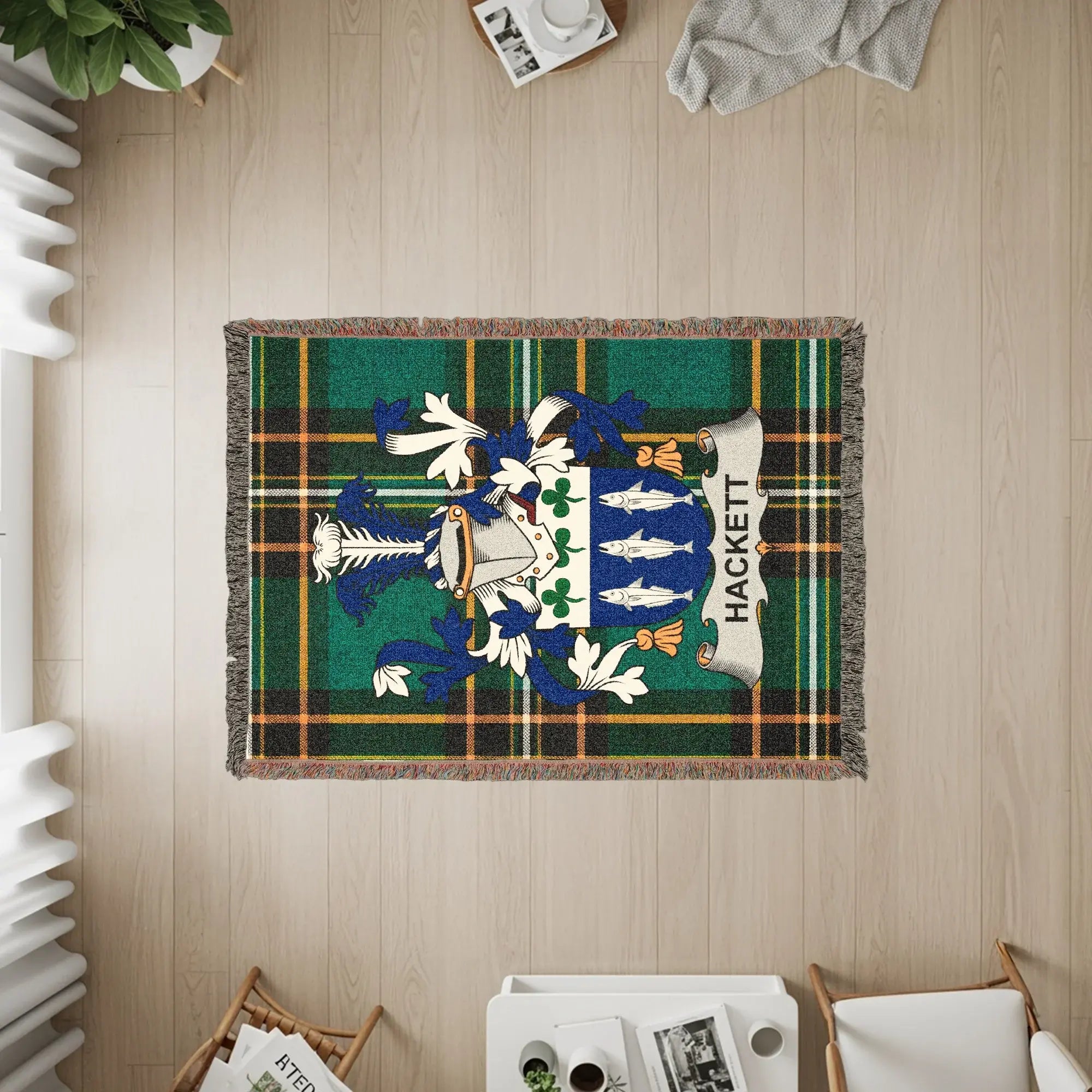 HACKETT family crest woven blanket with tartan plaid background and fringed edges.