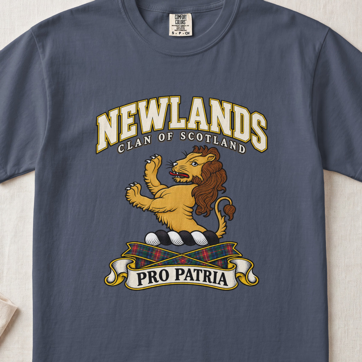 Newlands Scottish clan T-shirt in Midnight, front view with a golden lion standing upright and motto design.