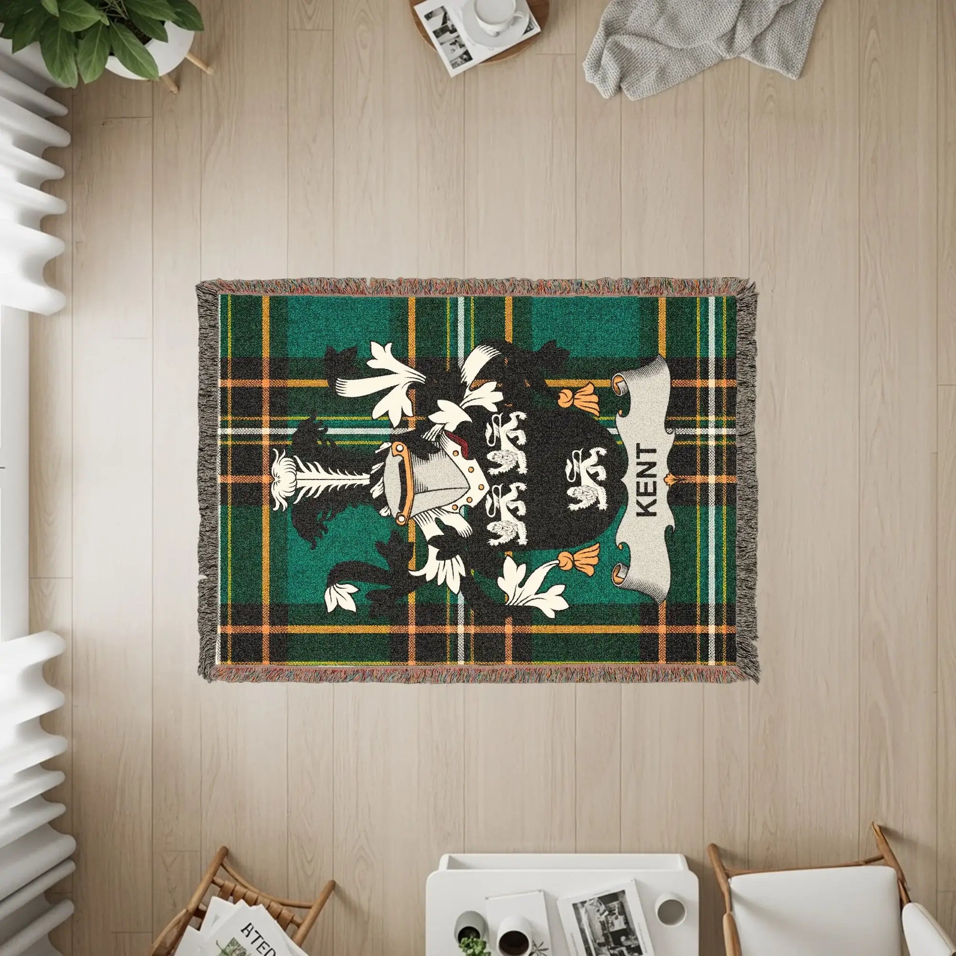 Woven throw blanket featuring the Kent family crest on a plaid background.