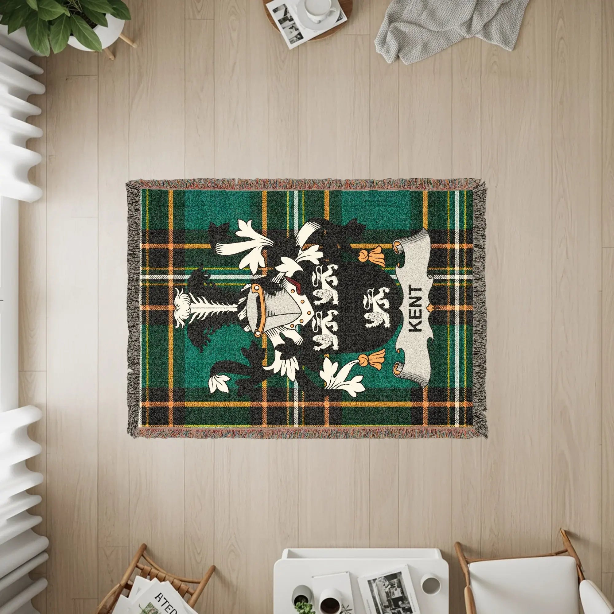 Woven throw blanket featuring the Kent family crest on a plaid background.