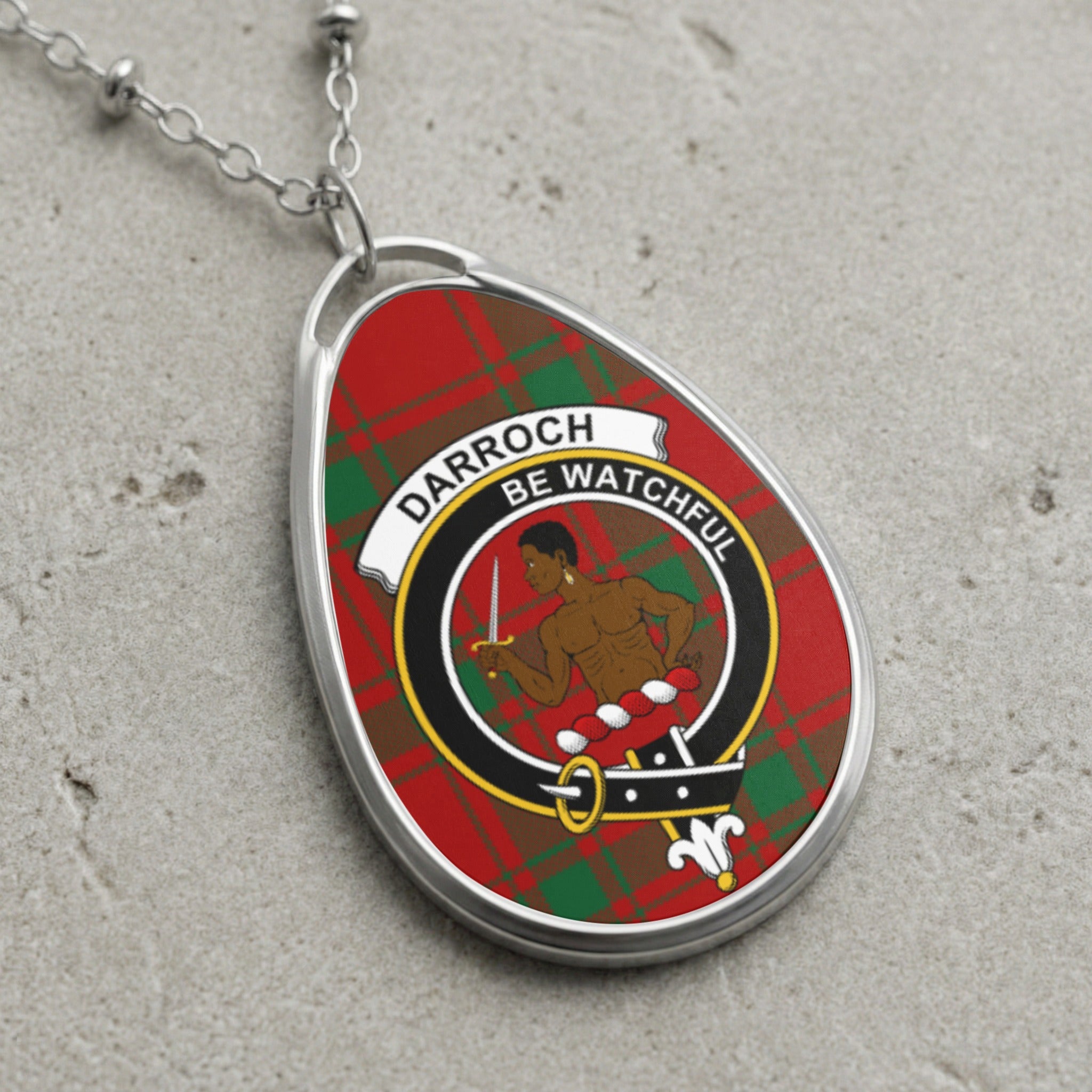 Darroch clan Scottish tartan necklace with clan crest on tartan background