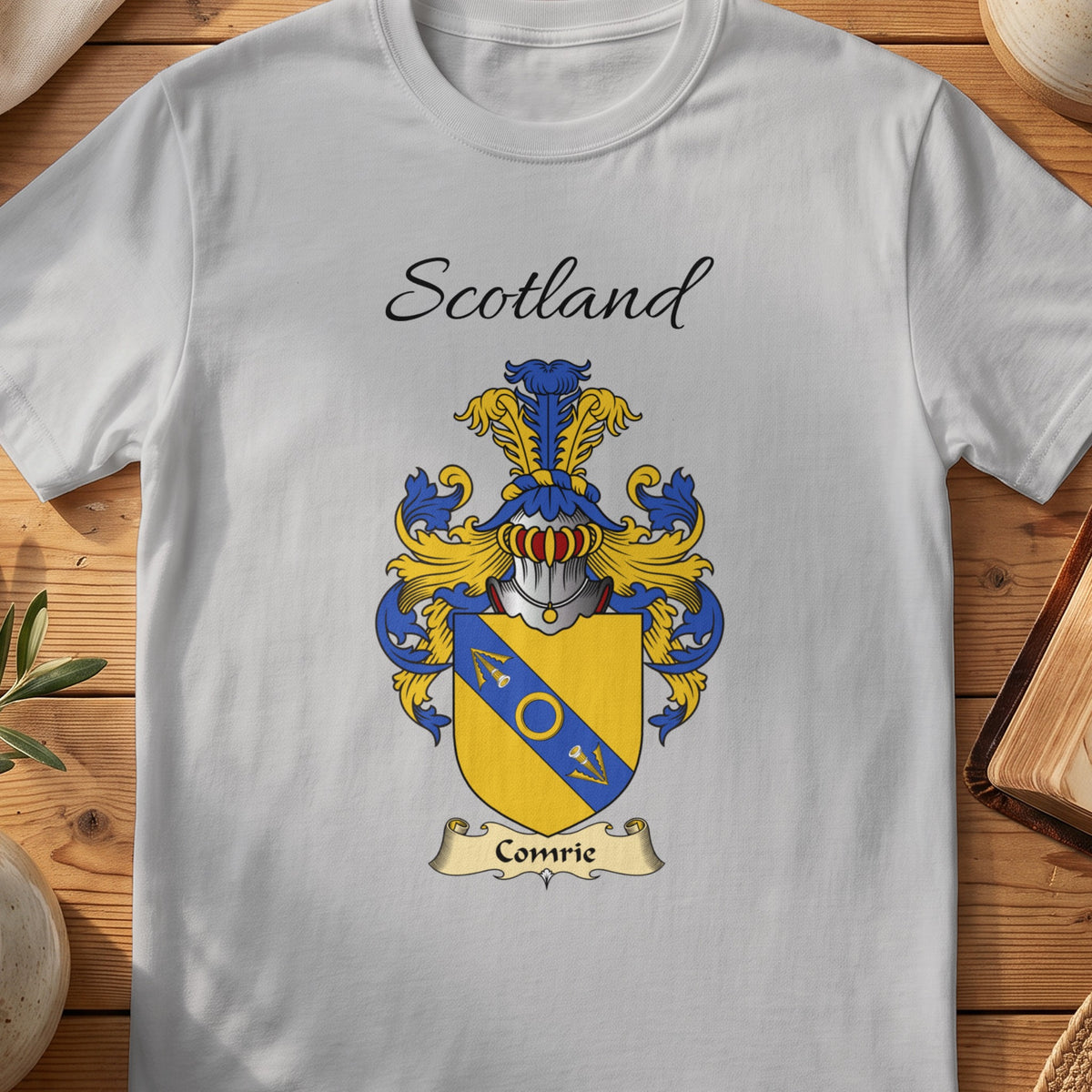 Sport Grey Comrie Scottish family shield T-shirt featuring a blue diagonal band with gold detailing