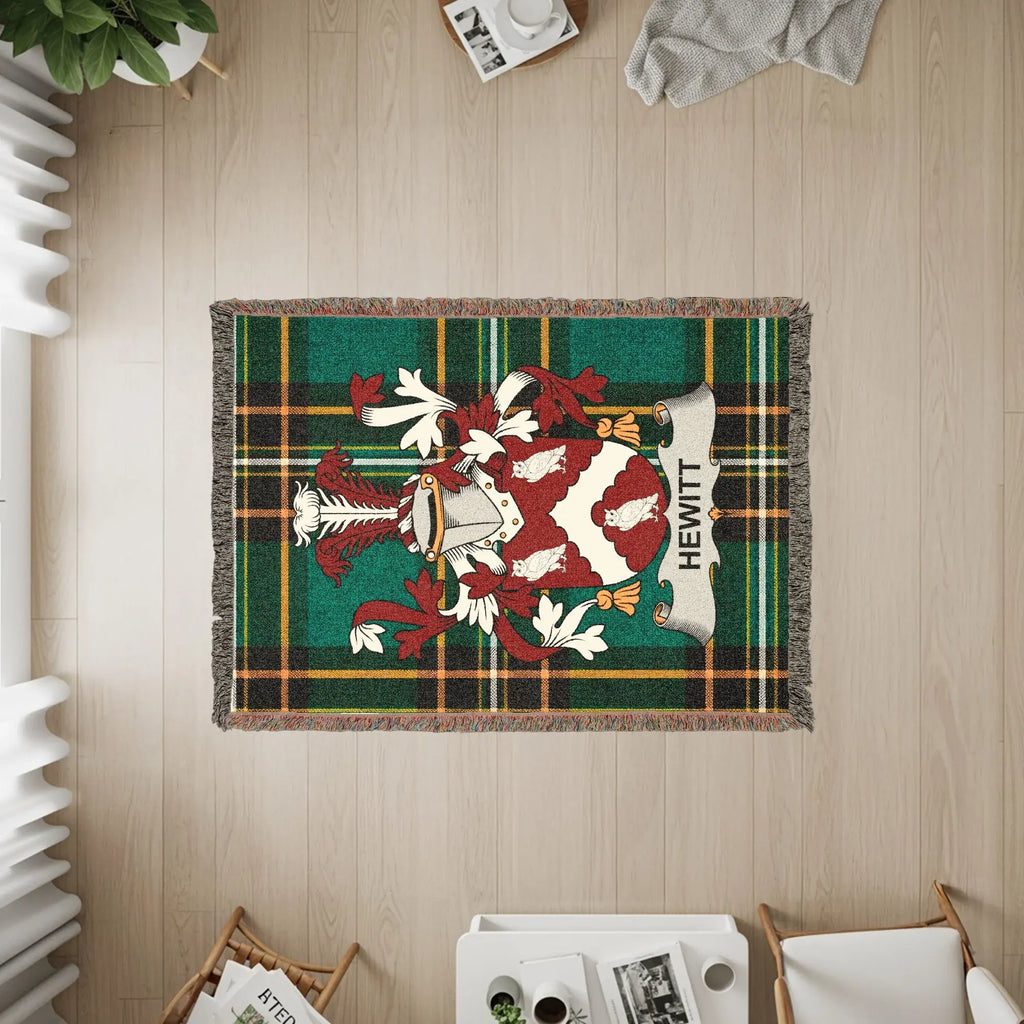 Hewitt family crest on a plaid woven blanket.