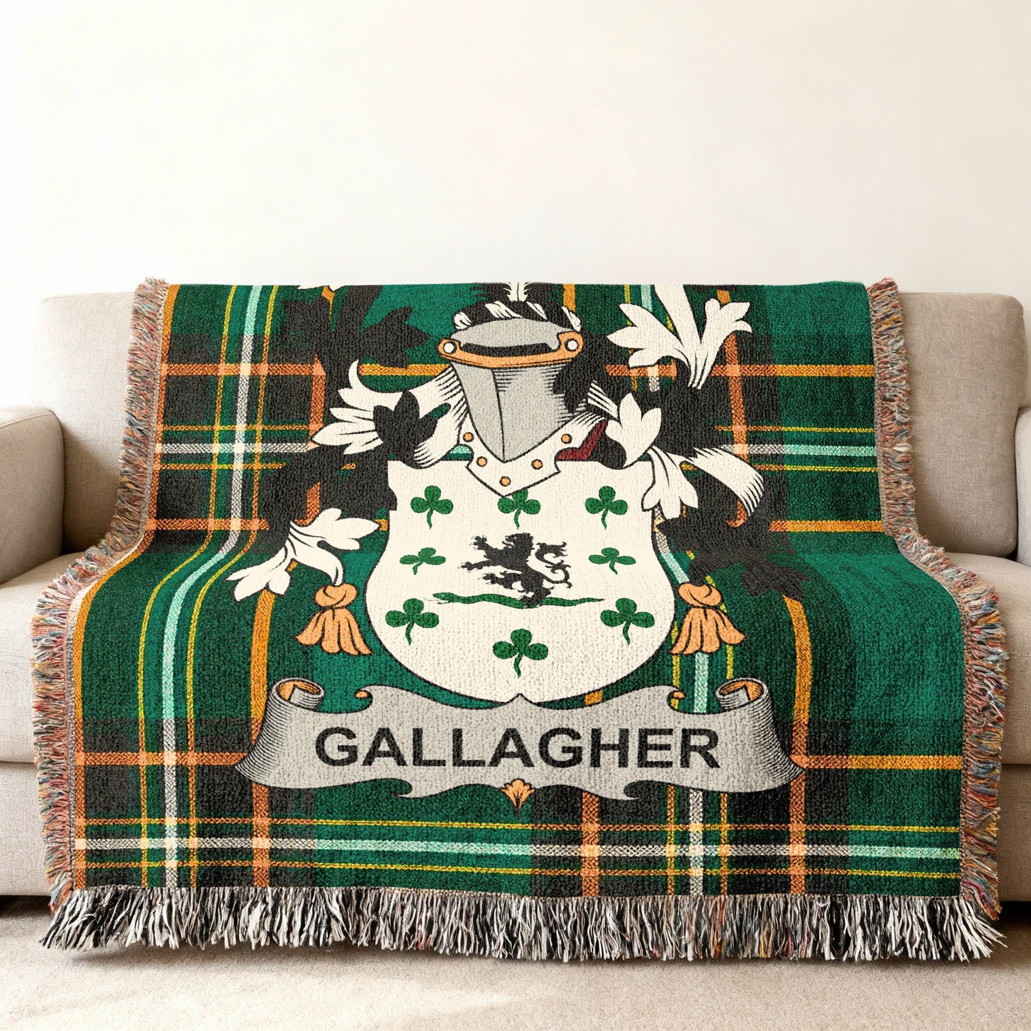 Gallagher family crest on a green tartan plaid throw blanket.