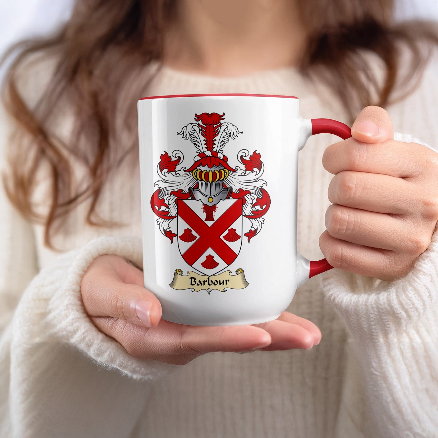 White mug with red rim and handle, featuring the Barbour family crest.