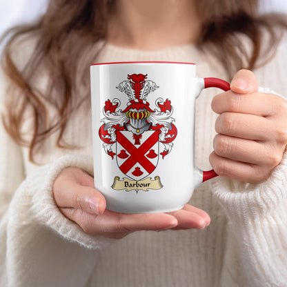 White mug with red rim and handle, featuring the Barbour family crest.