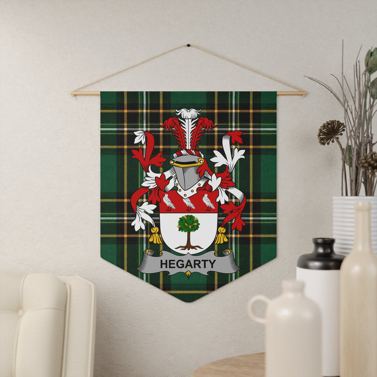 Hegarty family crest on green tartan banner hanging on a wall
