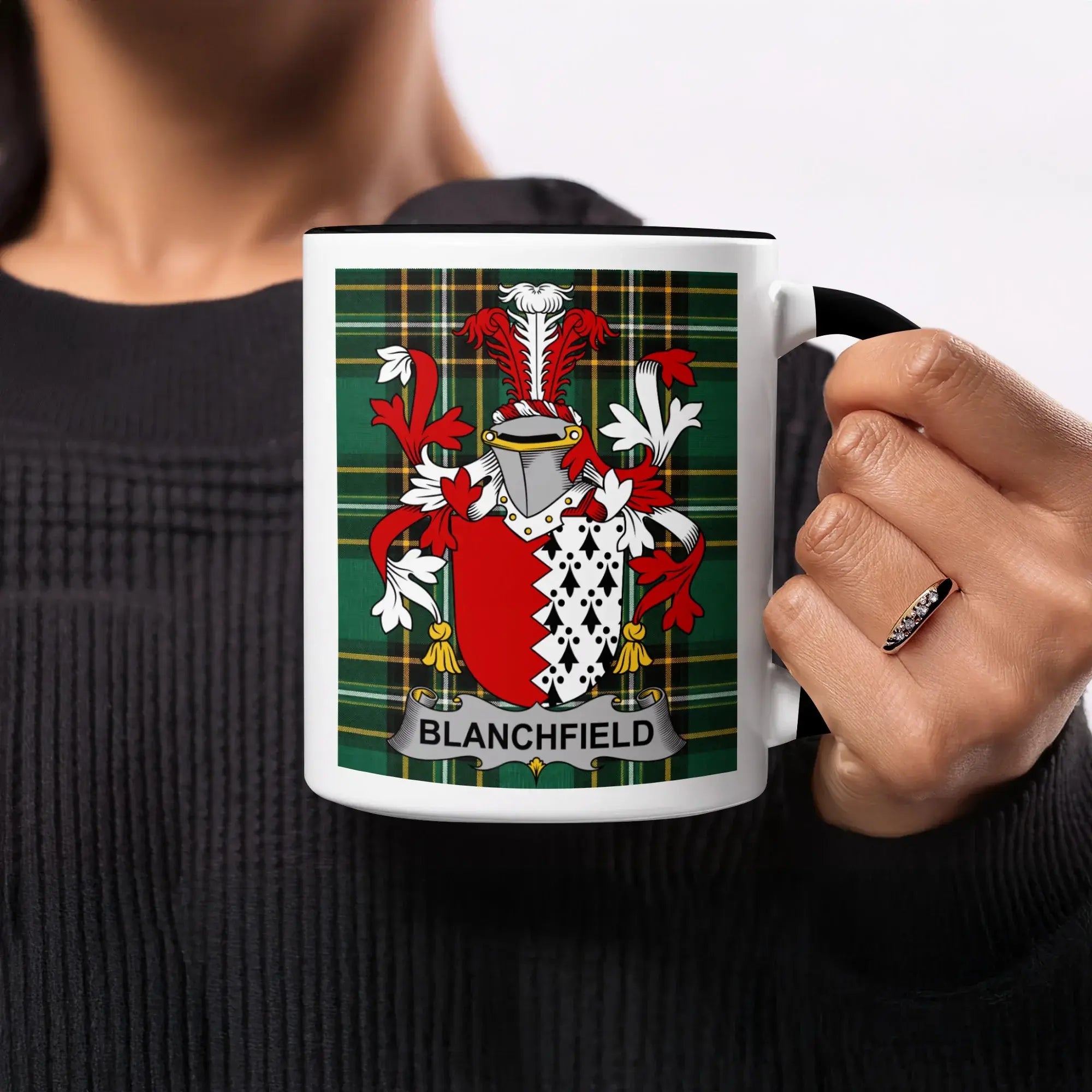 Mug with green tartan background and Blanchfield coat of arms.