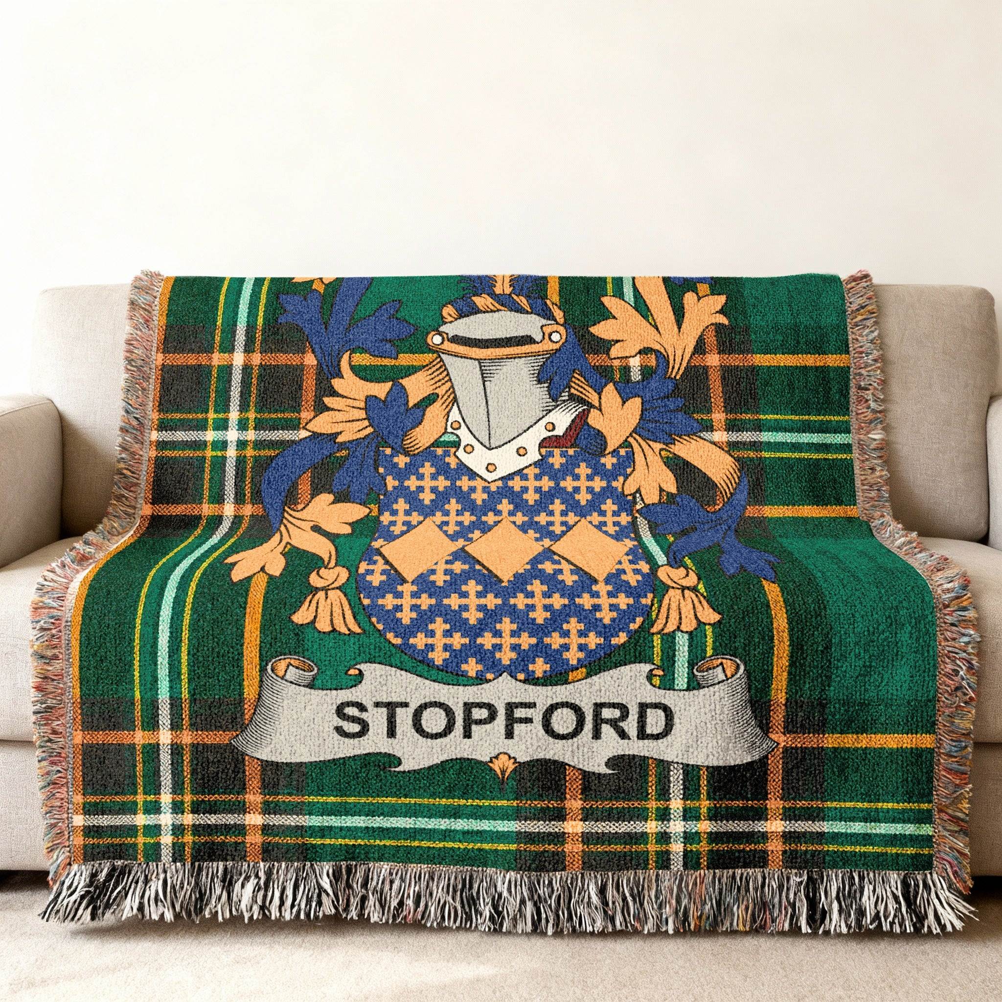 Green plaid throw blanket with Stopford family crest and name.