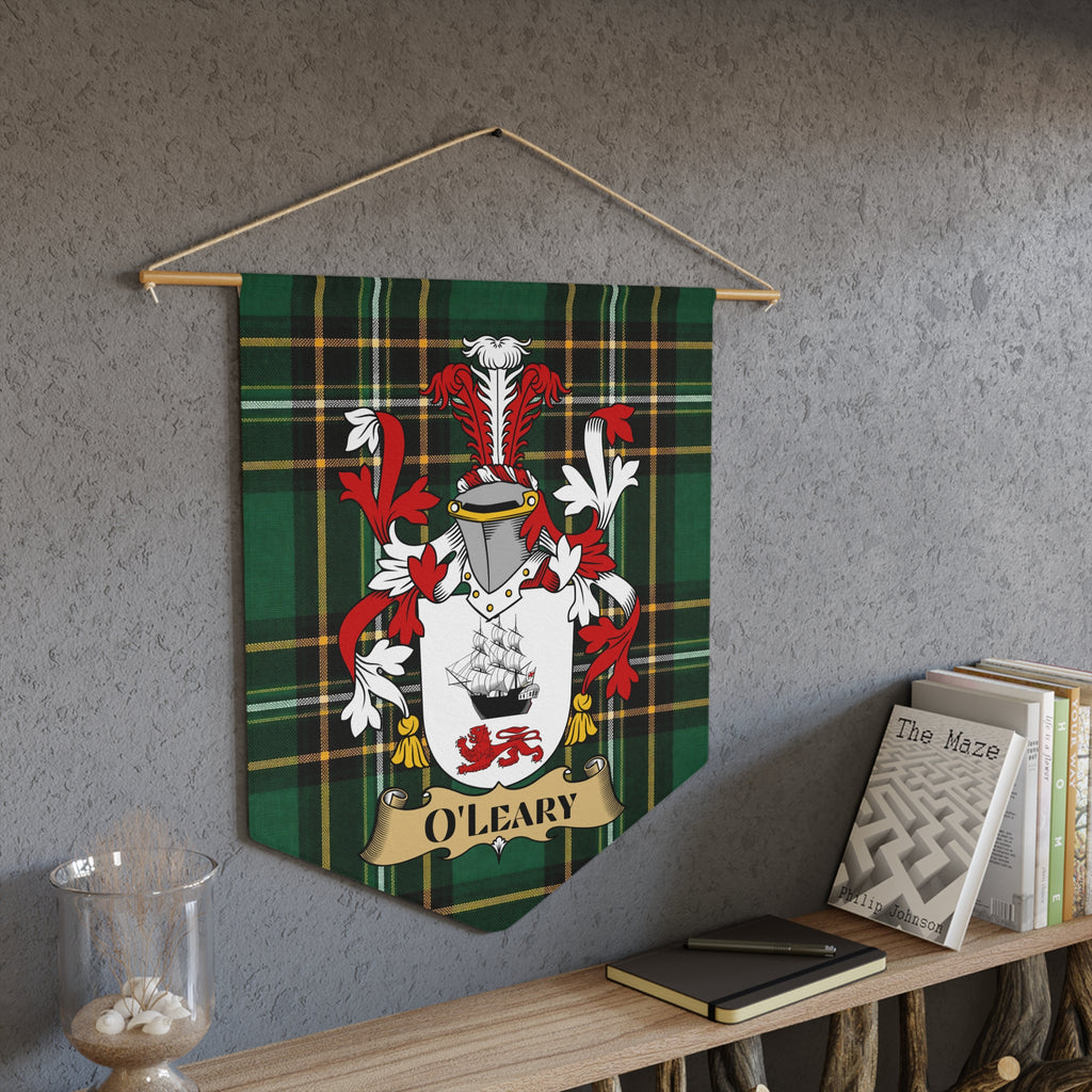 O'Leary coat of arms on green tartan pennant hanging on a wall.