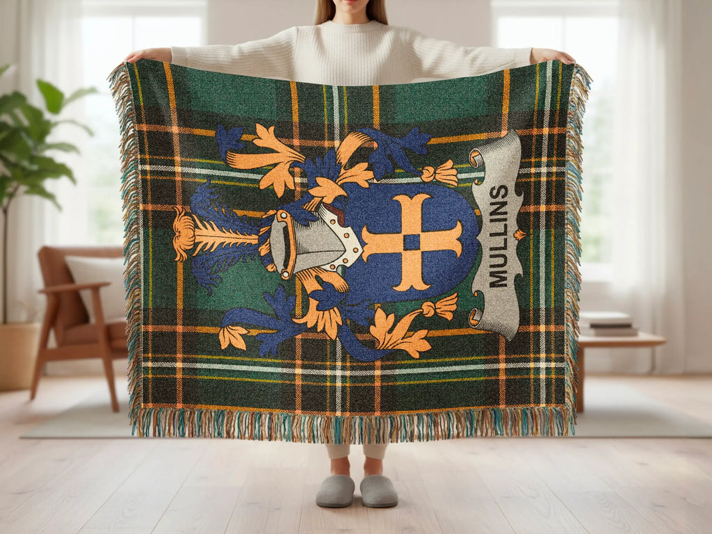 Tartan blanket with a blue and gold crest featuring the name "Mullins".