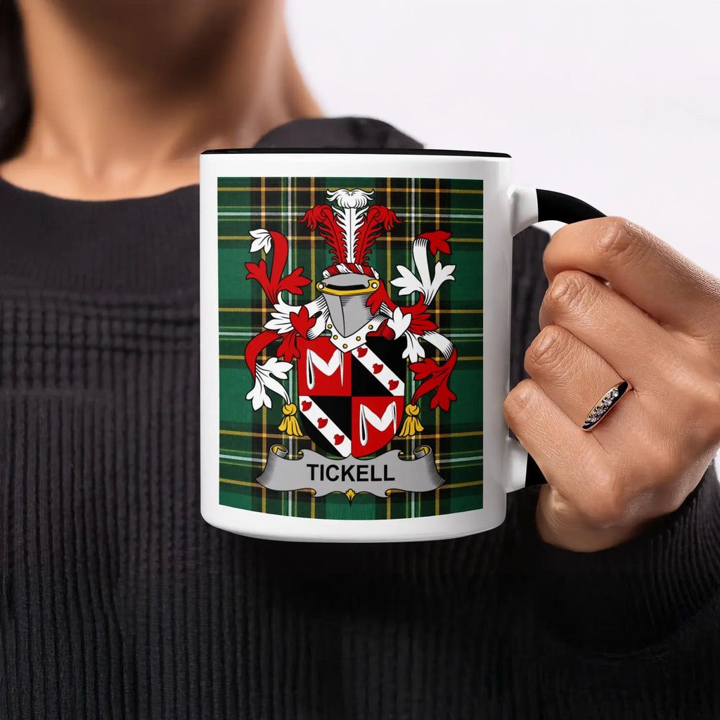 Mug with Tickell family crest on plaid background.