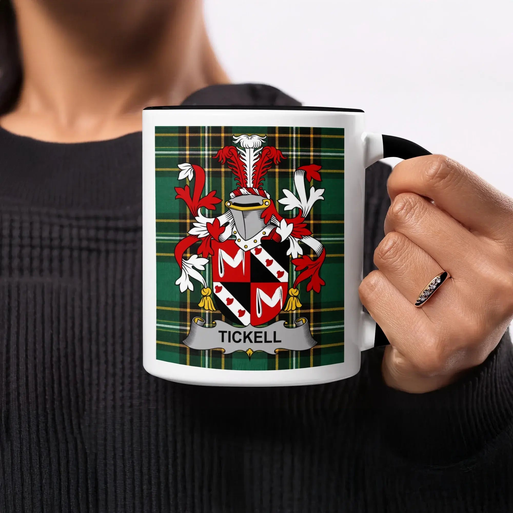 Mug with Tickell family crest on plaid background.