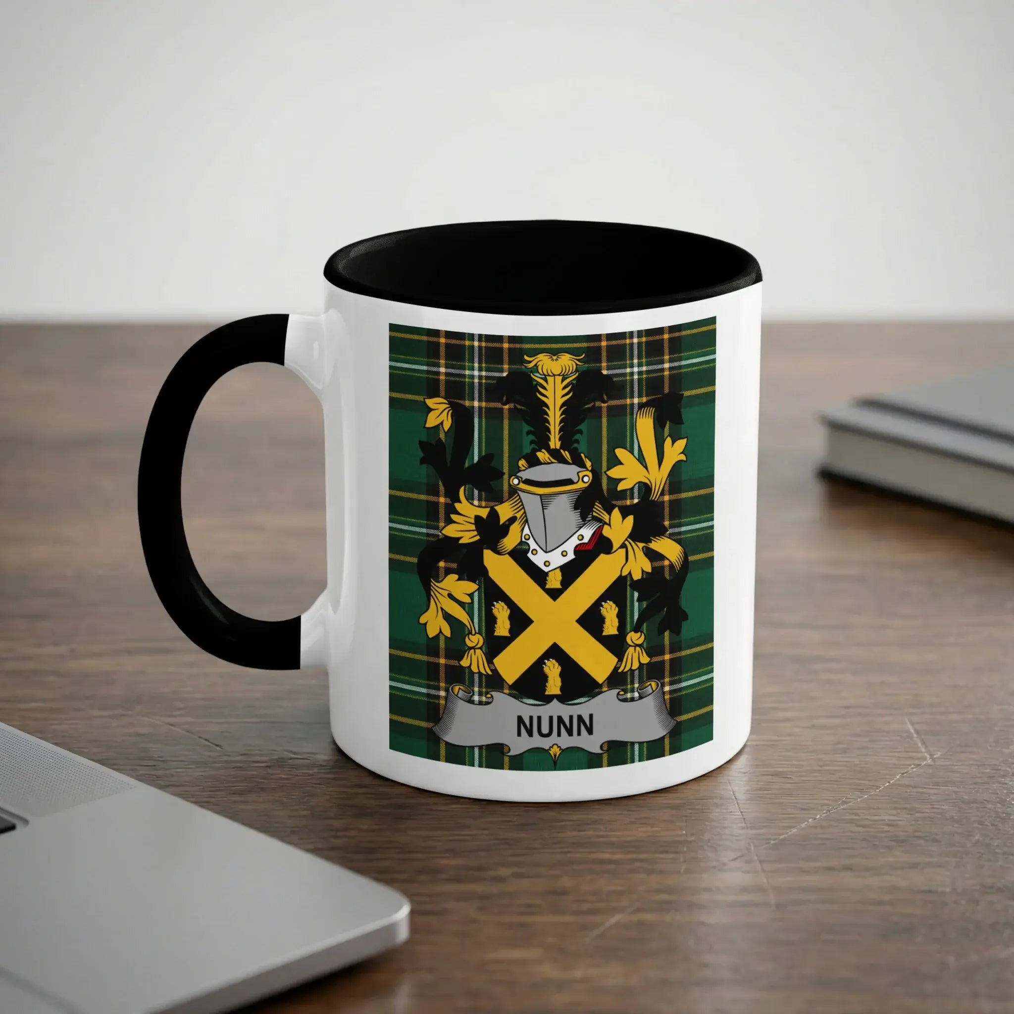 Nunn black accent mug with family crest on tartan background