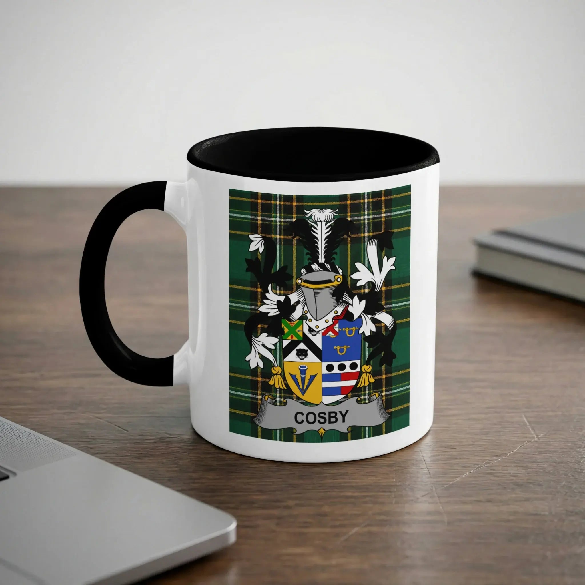 White mug with black rim featuring the Cosby family crest.