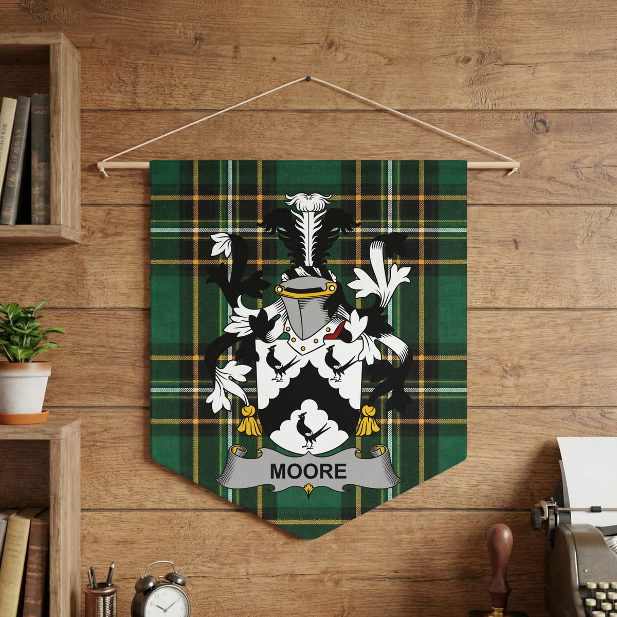 Green tartan banner displaying the Moore family crest and name.