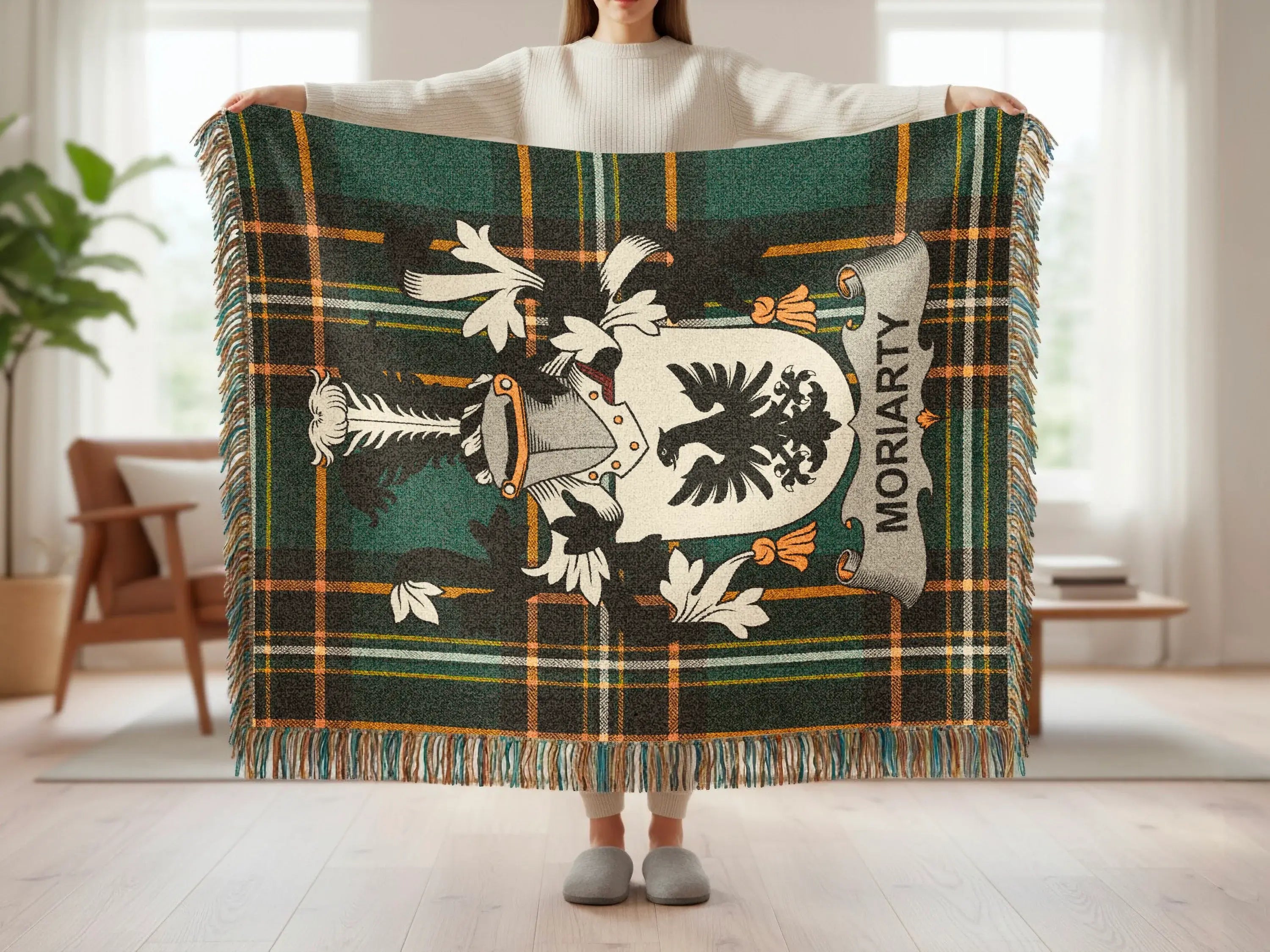 Moriarty tartan throw blanket with coat of arms and fringe.