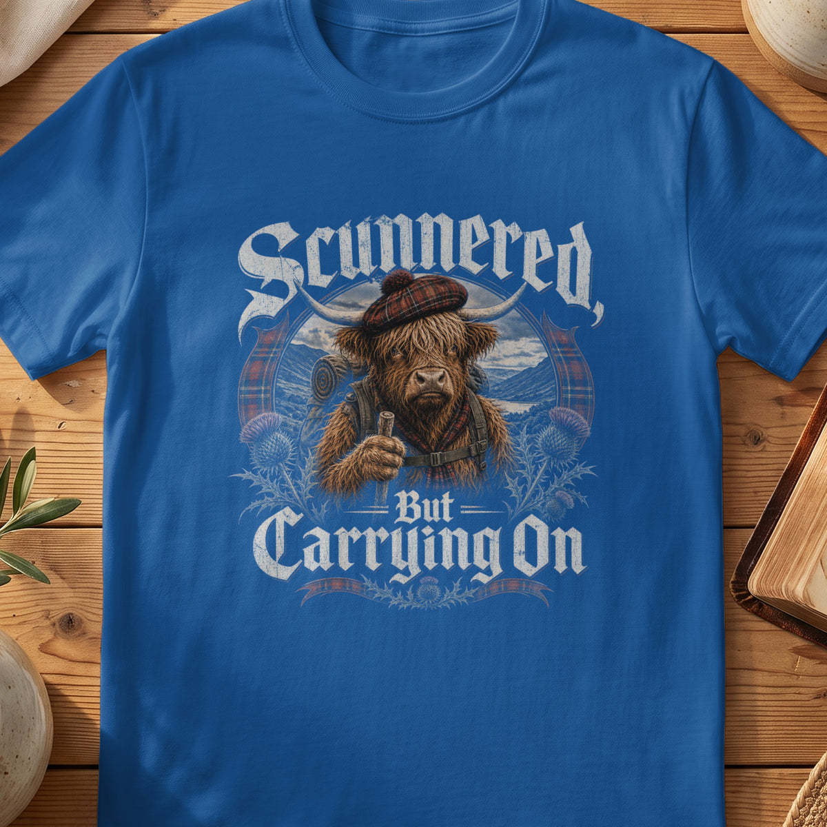 Highland cow wearing a tartan hat and backpack, holding a drink, with text "Stunnered, But Carrying On".