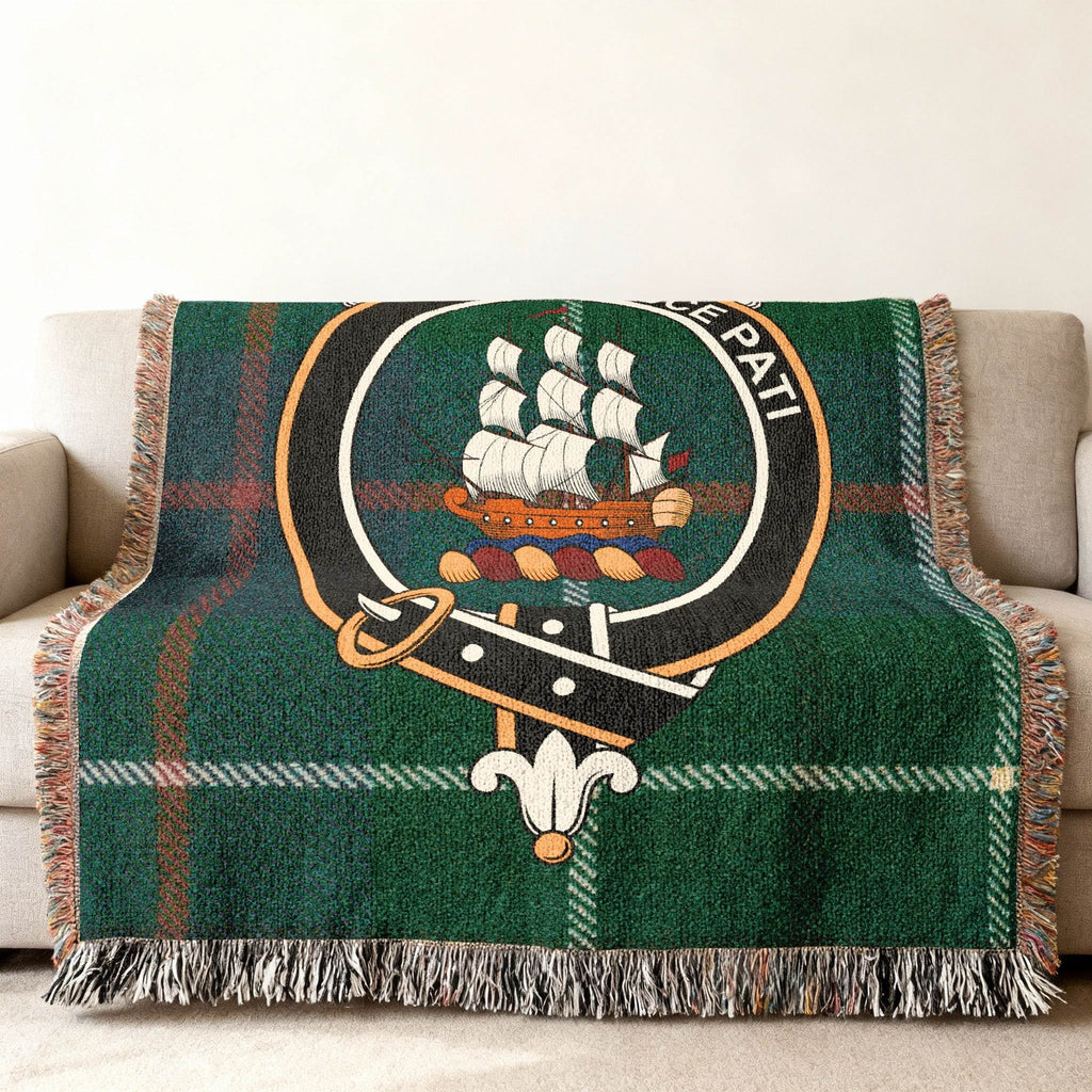 Scottish Clan Duncan crest tartan woven blanket draped on a couch