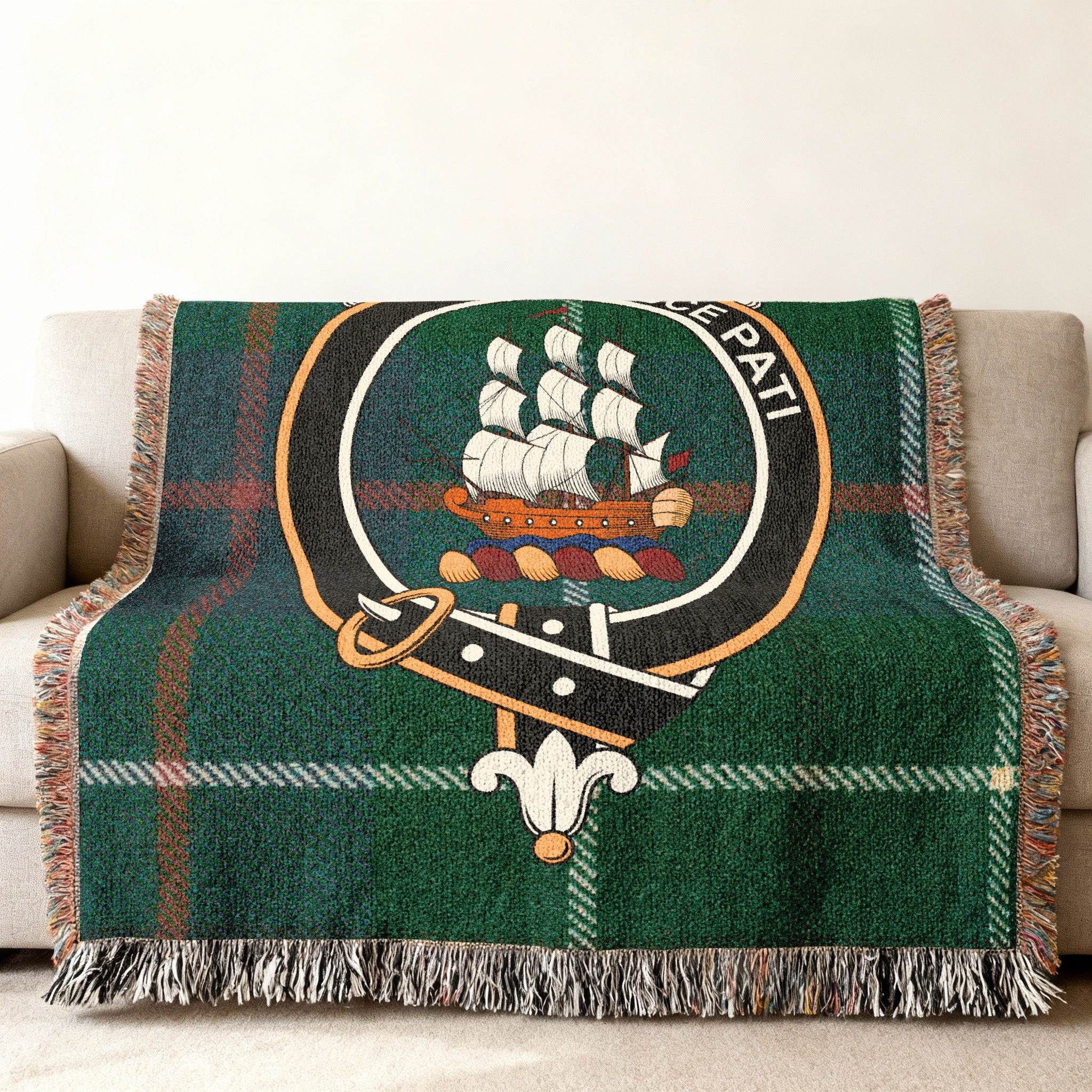 Scottish Clan Duncan crest tartan woven blanket draped on a couch