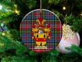 Bartholomew Scottish clan ceramic ornament with family crest on a Caledonia tartan background, hanging on a Christmas tree