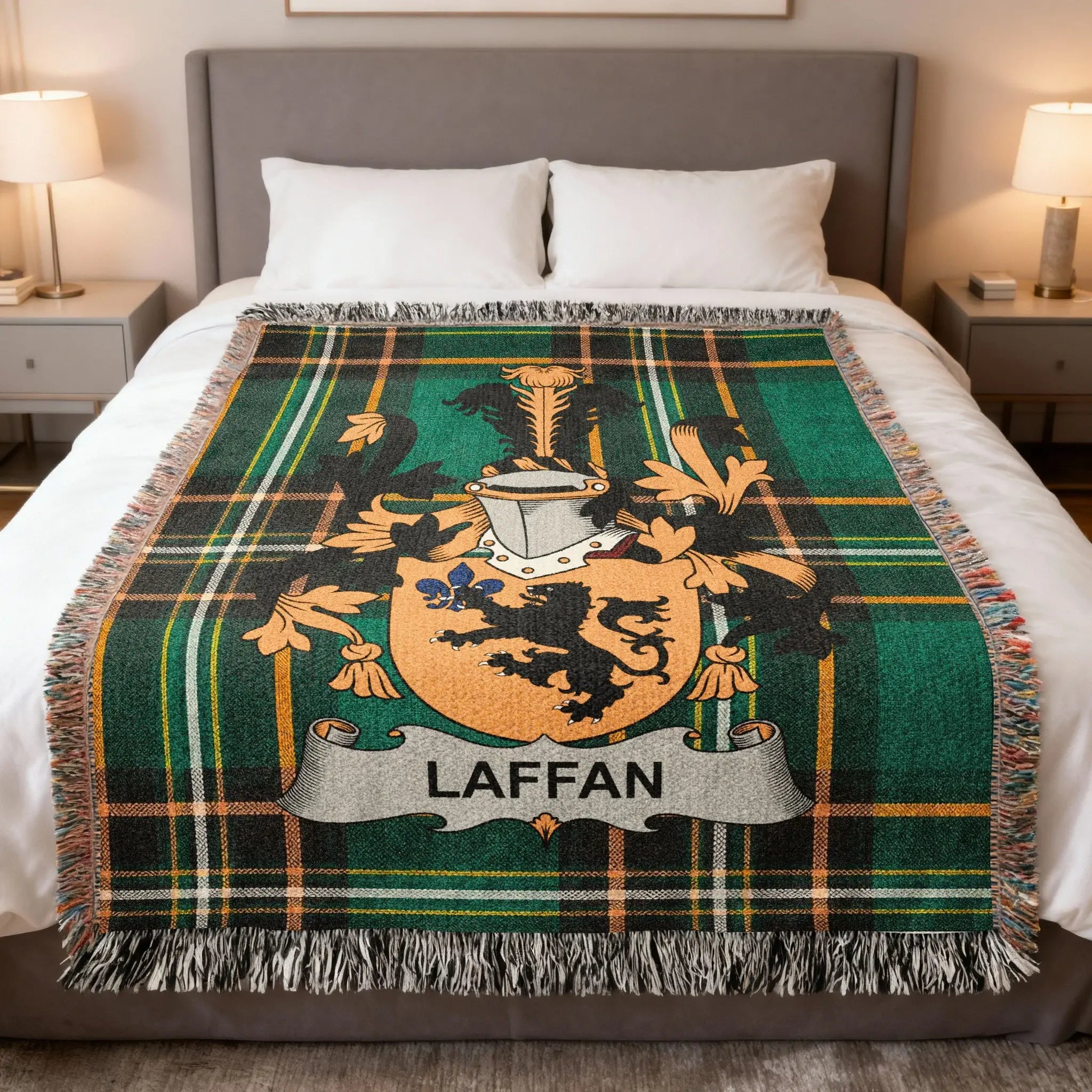 Green plaid throw blanket with a family crest and "LAFFAN" banner.