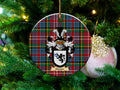 Harper Scottish clan ceramic ornament with family crest on a Caledonia tartan background, hanging on a Christmas tree