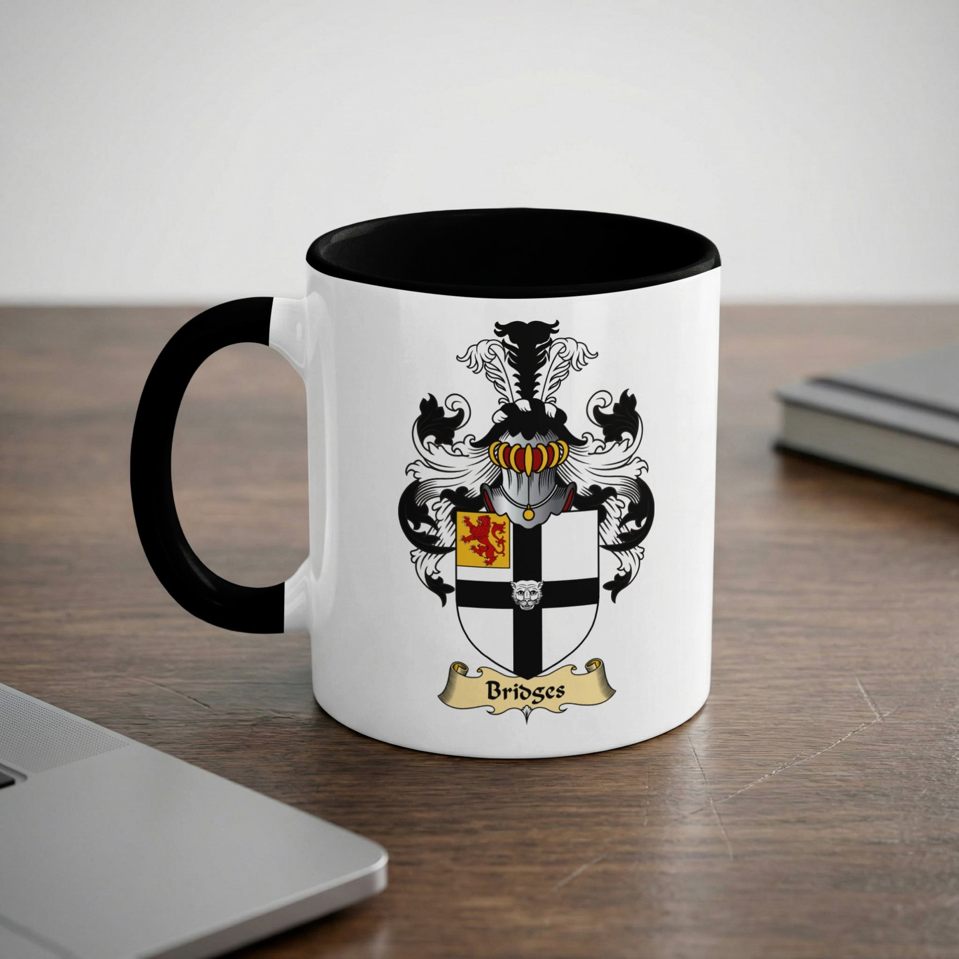 Mug with black rim and handle, featuring a coat of arms with "Bridges" text.