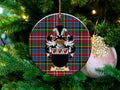 Arthur Scottish clan ceramic ornament with family crest on a Caledonia tartan background, hanging on a Christmas tree