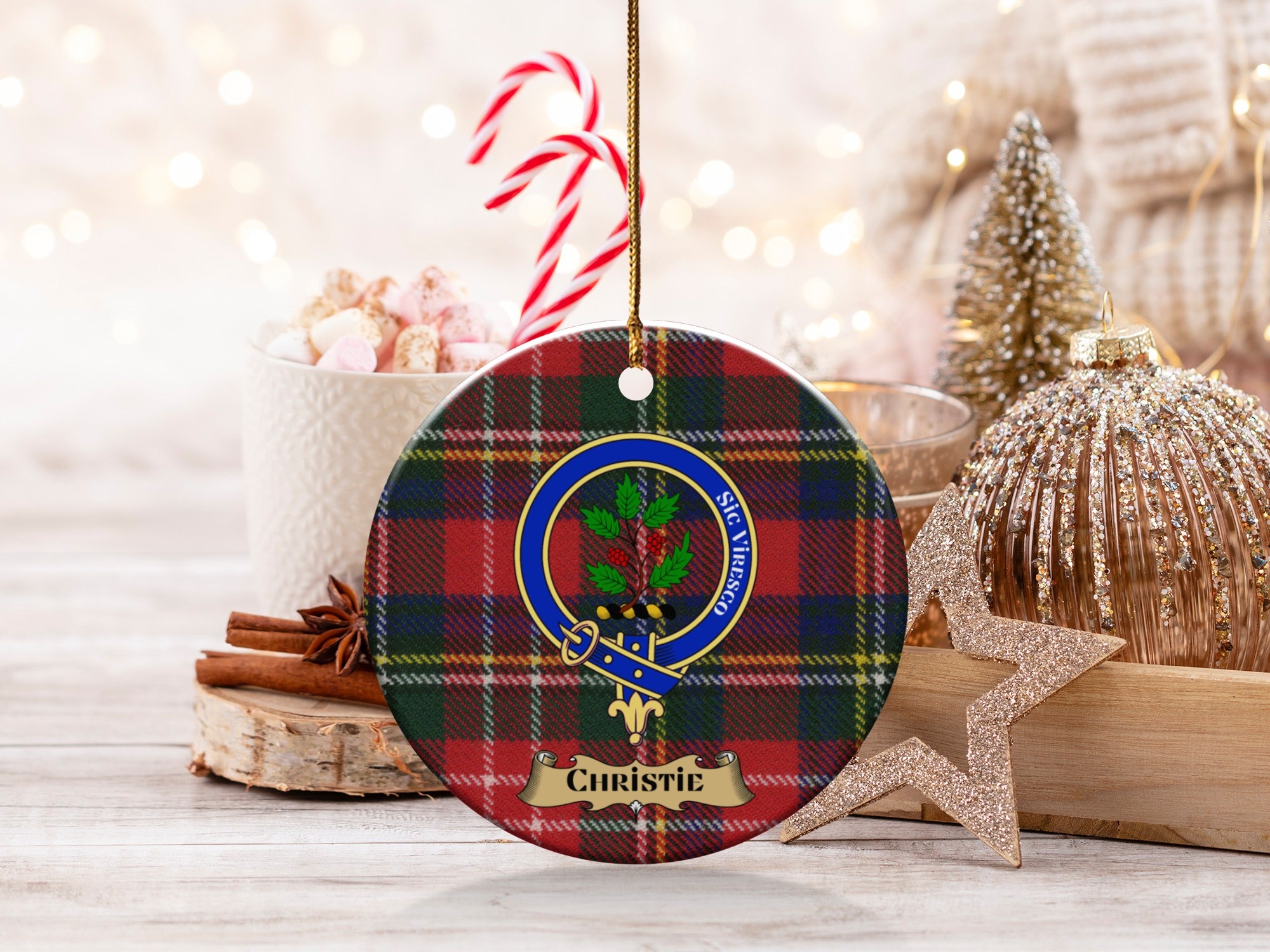 Christie clan tartan ornament with crest among holiday decorations
