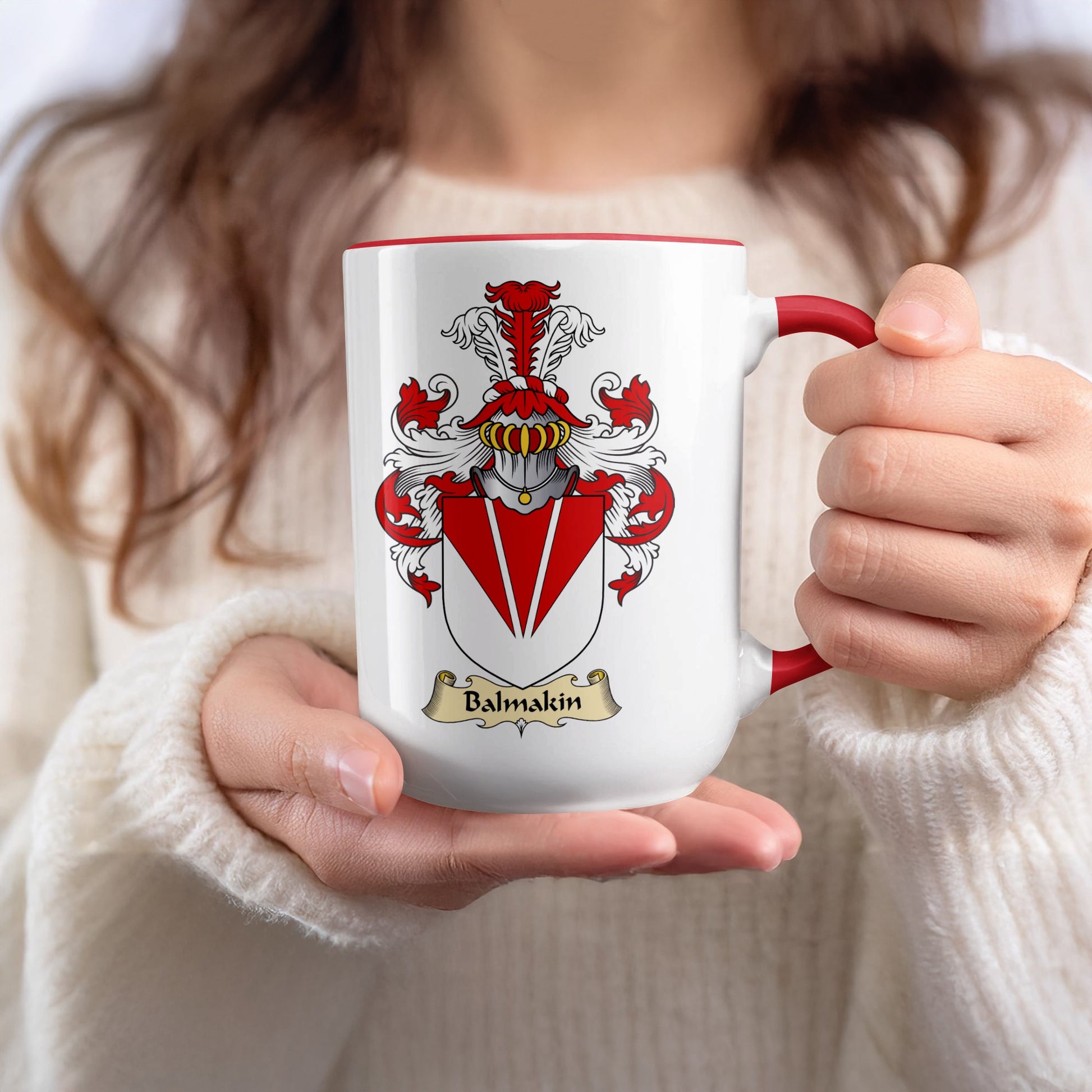 White mug with red handle and crest featuring "Balmakin" text.