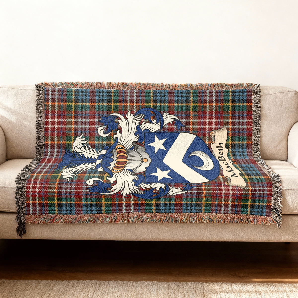 MacBeth Scottish woven blanket with family shield and Caledonia tartan background