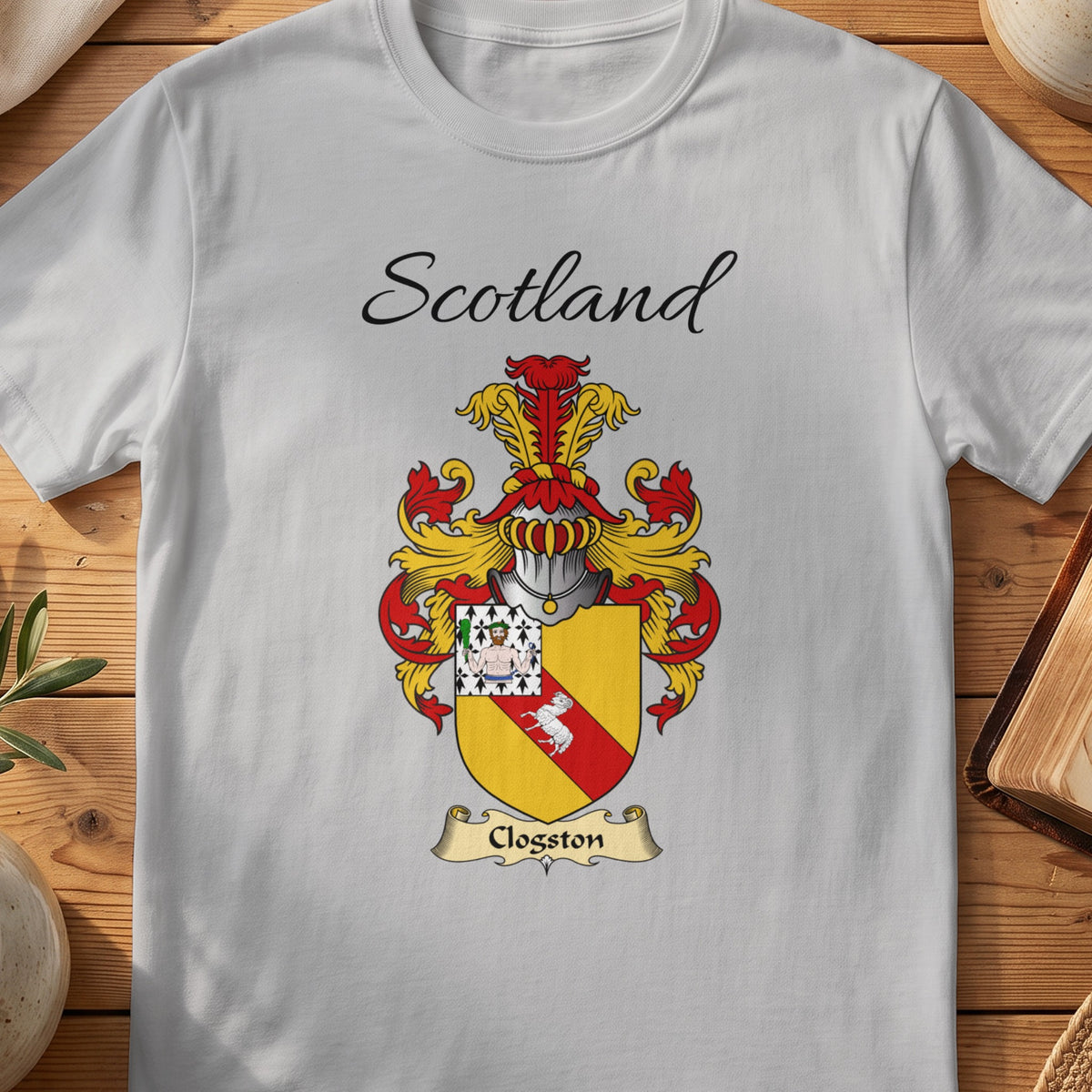 Sport Grey Clogston Scottish family shield T-shirt featuring a red diagonal band on gold with a patterned corner