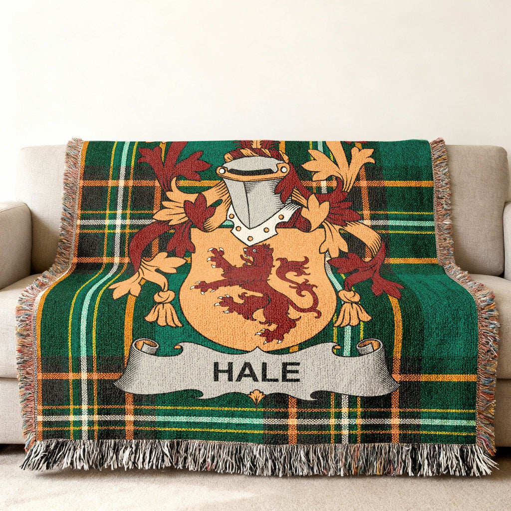 Green tartan blanket with the Hale family crest displayed prominently.