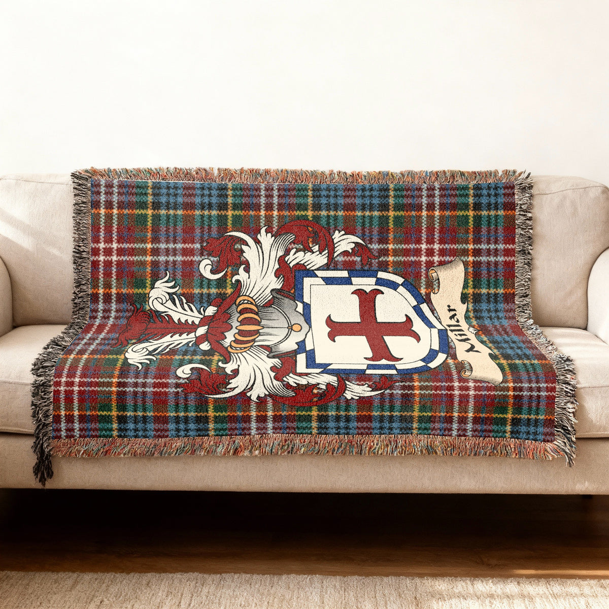 Millar Scottish woven blanket with family shield and Caledonia tartan background