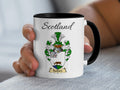 Raeburn Scottish family crest accent mug with Scotland above the coat of arms design