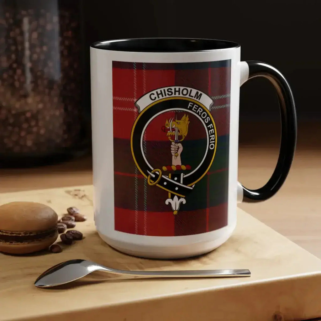 Close-up of Chisholm clan crest on 11oz mug — green-red tartan and Feros Ferio motto