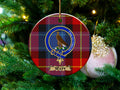 Watt clan crest tartan ceramic ornament hanging on a Christmas tree