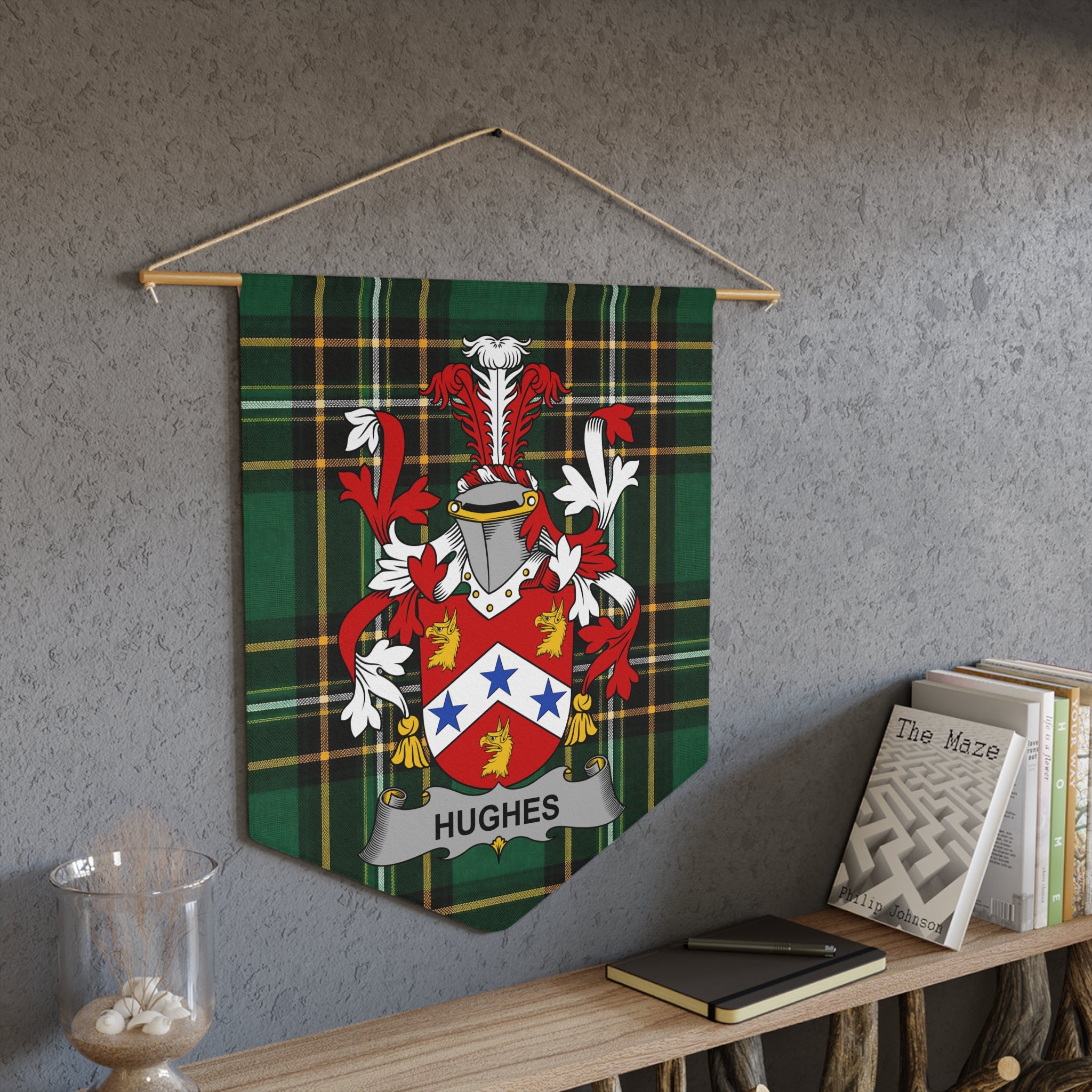 Tartan banner with the Hughes coat of arms and family name displayed.