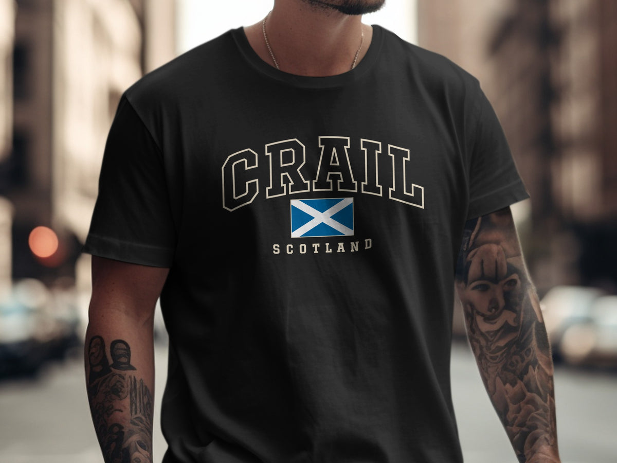 Model wearing the Black Crail Scotland Comfort Colors T-shirt with the Scottish Saltire