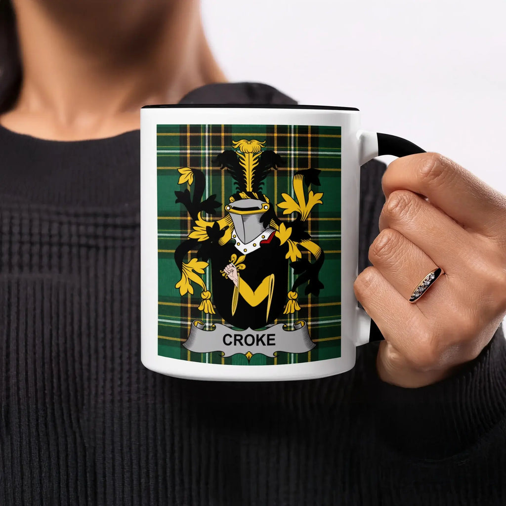 Mug featuring the Croker family crest on a green tartan background.