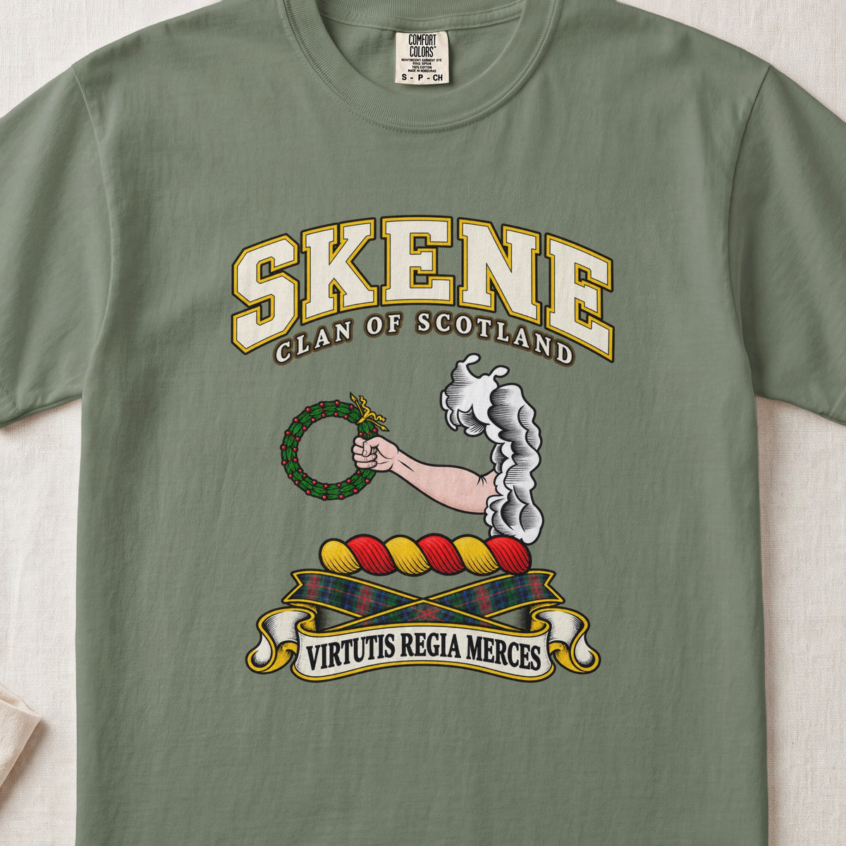 Skene Scottish clan T-shirt in Moss, front view with an arm extending from clouds and holding a green wreath and motto design.