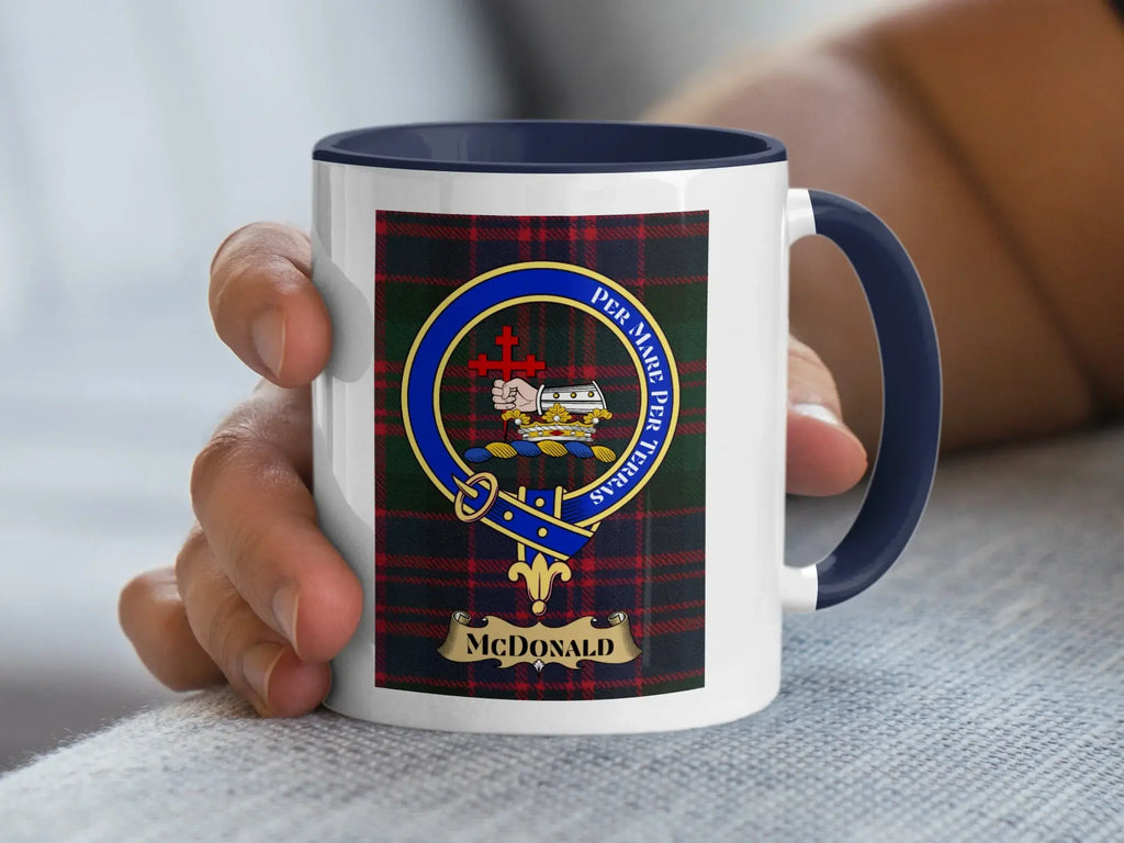 White mug with navy blue rim and handle, featuring McDonald tartan and crest.