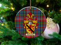 Abernethy Scottish clan ceramic ornament with family crest on a Caledonia tartan background, hanging on a Christmas tree
