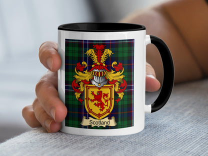 Mug with Scottish tartan and family crest, text "Scotland" below.