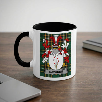 White mug with black rim and handle featuring a green, red, and white plaid crest with the name DAVOREN.